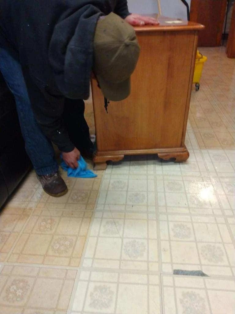 Detailed floor cleaning during water damage restoration in Chicago