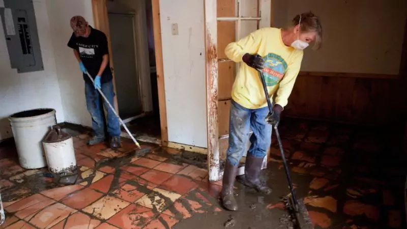 The CleanUP Guys crew cleaning a flooded basement in Chicago