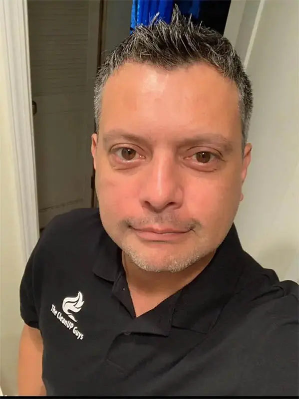 Cesar, Master Restoration Tech at The CleanUP Guys
