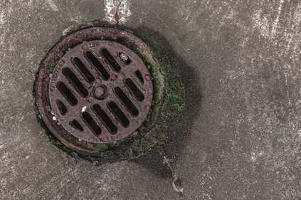 Rusted sewer drain that caused a sewage backup in a Chicago home